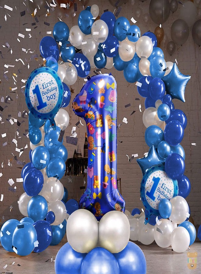 JUST PARTY مجموعة زينة عيد الميلاد الأول من جست بارتي، 35 قطعة - بالون فويل أزرق على شكل رقم 1، بالونات فويل زرقاء على شكل نجمة، بالونات فويل دائرية مطبوعة عليها عبارة "عيد ميلاد أول للأولاد"، بالونات معدنية بيضاء وزرقاء. - Image 1